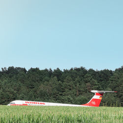 Scenic view of green landscape against clear sky