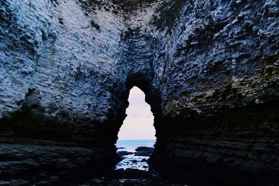 Woman in cave