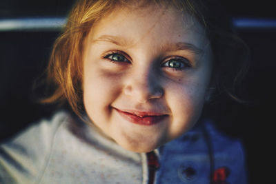 Portrait of smiling cute girl