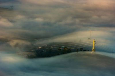 Scenic view of bridge against sky at dusk