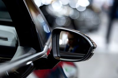 Close-up of car on side-view mirror