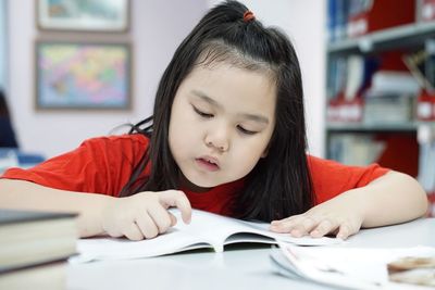 Girl studying at table