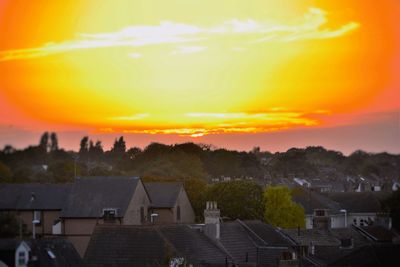 High angle view of houses during sunset