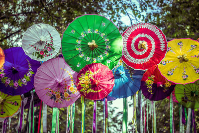 Close-up of multi colored umbrellas at indonesian festival