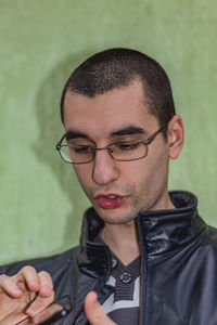 Portrait of young man with eyeglasses