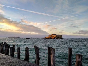 Scenic view of sea against sky during sunset