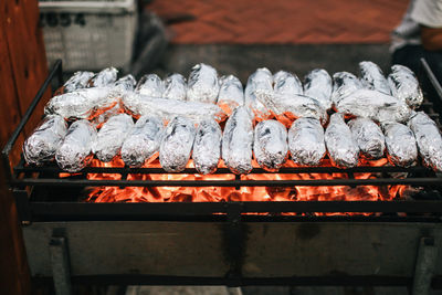 Close-up of meat on barbecue grill