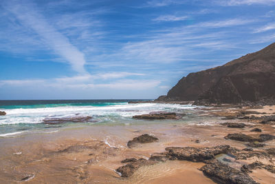 Scenic view of beach against sky