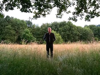 Full length of man standing on field