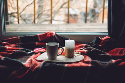 Close-up of coffee cup on table