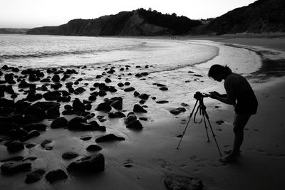 Rear view of man on beach
