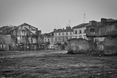 Old buildings against clear sky in city