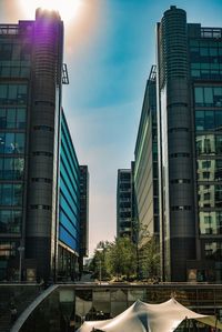 Low angle view of skyscrapers against sky