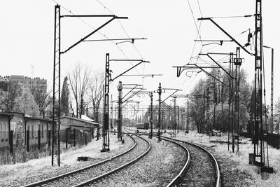 View of railway tracks against clear sky during winter