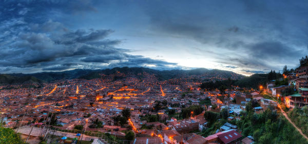 High angle view of illuminated buildings in city