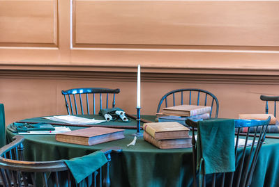 Empty chairs and table at restaurant