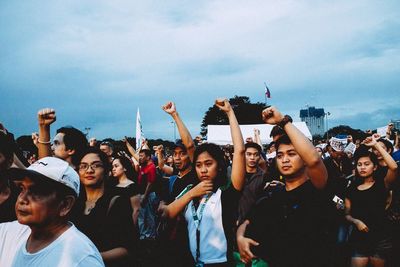 Group of people against the sky