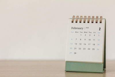 Desktop calendar for february 2022 on a light background.,