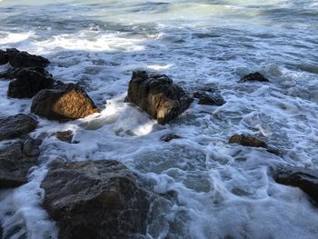 Scenic view of rocks in sea