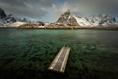 Scenic view of snowcapped mountains against sky during winter