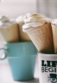 Close-up of coffee cup on table