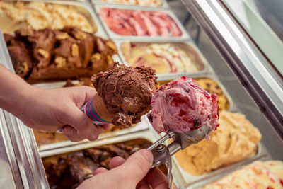 Hand holding ice cream
