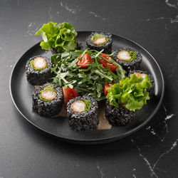 High angle view of salad in plate on table