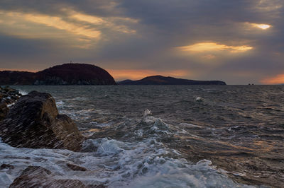 Scenic view of sea against sky during sunset