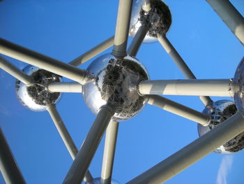 Low angle view of pole against clear blue sky