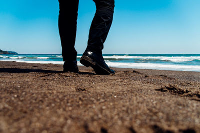 Low section of man on beach