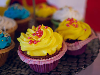 Close-up of cupcakes on table