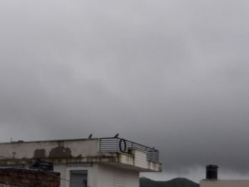 High section of building against sky