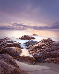 Scenic view of sea against sky during sunset