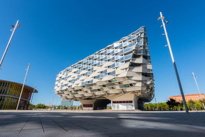 Low angle view of building against blue sky