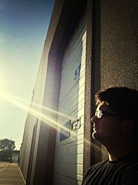 Sun shining through building