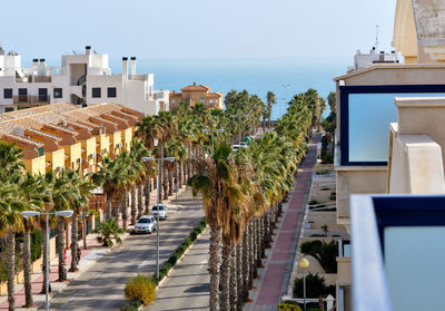 Panoramic view of buildings and sea against sky