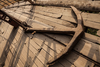 High angle view of old boat anchor 