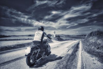 View of road against cloudy sky