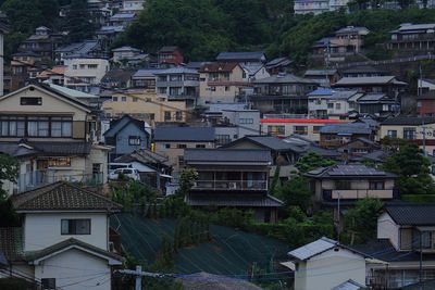 High angle view of residential buildings in city