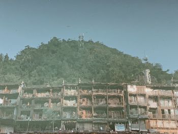 Buildings against clear sky