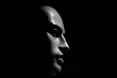Close-up of mannequin in darkroom