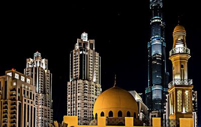 Low angle view of modern building at night