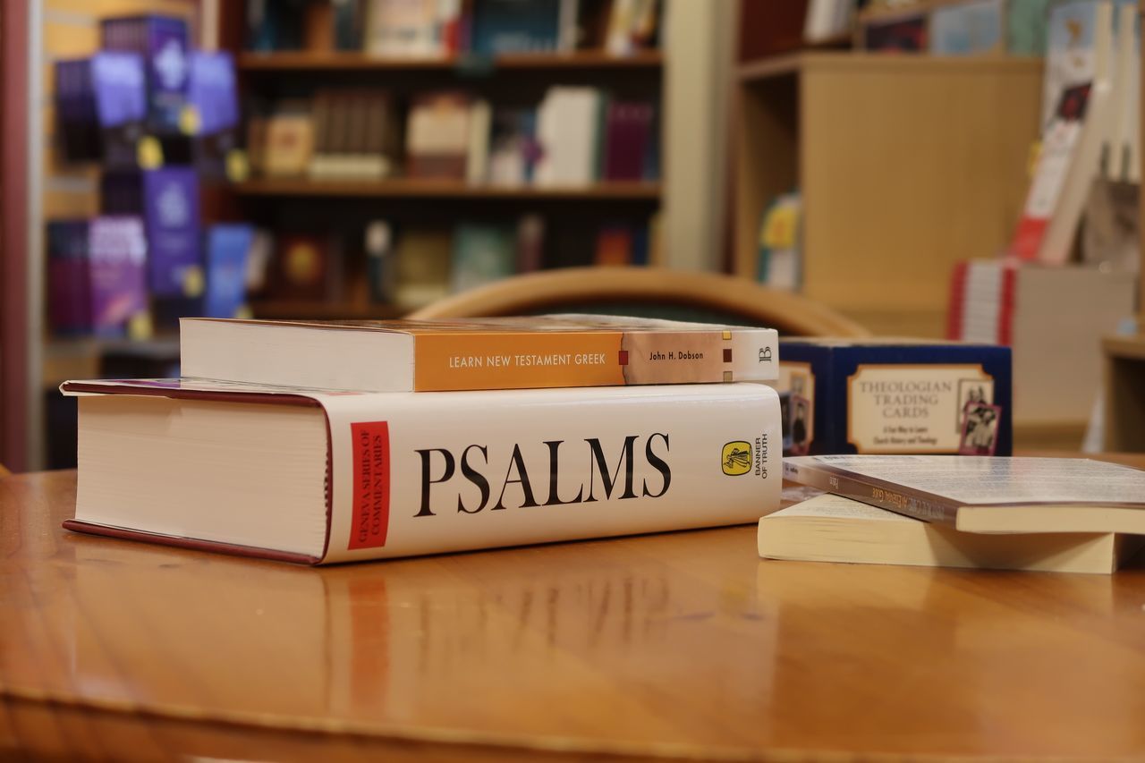 CLOSE-UP OF TEXT ON TABLE