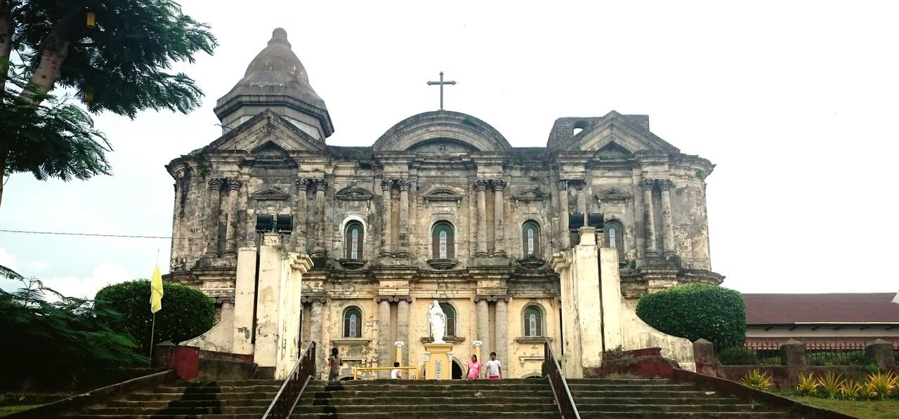 architecture, built structure, building exterior, clear sky, tree, low angle view, place of worship, religion, history, steps, incidental people, famous place, travel destinations, travel, tourism, sky, spirituality, facade, day