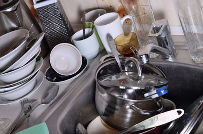 Close-up of kitchen utensil in sink at home