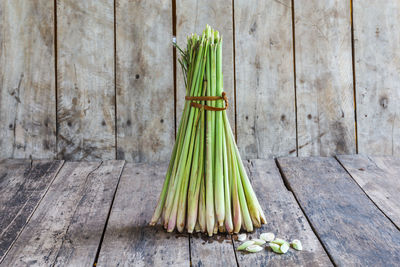 Harvested lemongrass on a wooden table