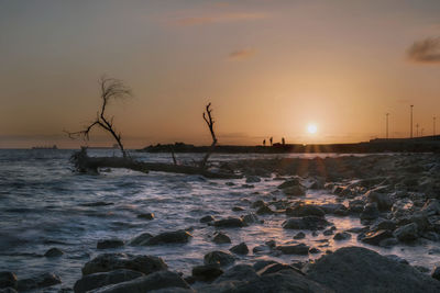 Scenic view of sea against sky during sunset