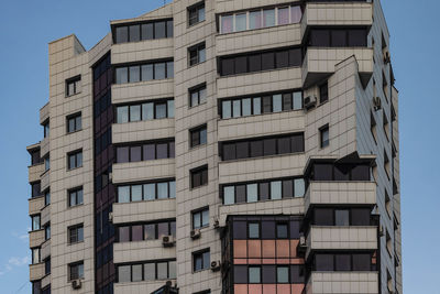 Low angle view of modern building against sky