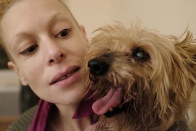Portrait of cute girl with dog