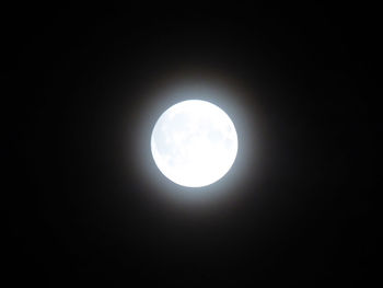 Low angle view of moon against sky at night